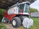 Rostselmash Vector 420 RSM 101 combine harvester with Power Stream 500 grain adapter