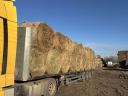 Round bale of lucerne from container