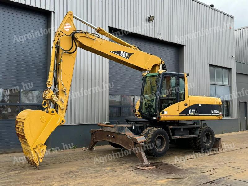 Rypadlo Caterpillar M322C s gumovými pneumatikami / 2003 / 15 655 hodin / Leasing od 20%