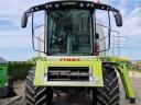 Kombajn CLAAS LEXION 750 se stolem VARIO 750 a jednonápravovým vozíkem se žacím stolem