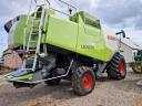 Kombajn CLAAS LEXION 750 se stolem VARIO 750 a jednonápravovým vozíkem se žacím stolem