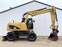 Caterpillar M313D – Tiltrotator / 2010 / 15 345 prevádzkových hodín / Prenájom od 20%