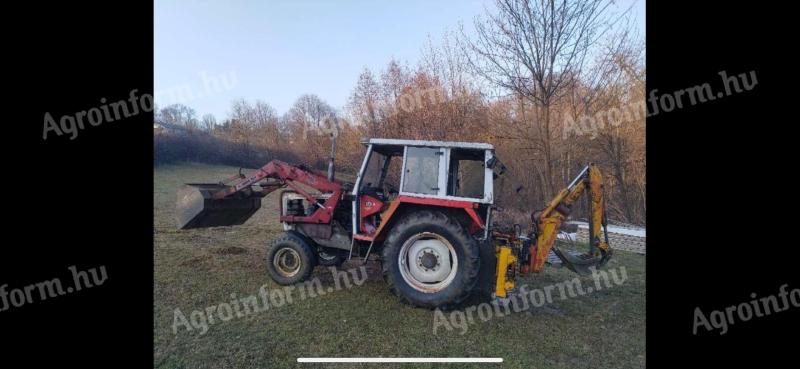 Steyer 8070 front loader excavator