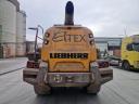 Liebherr L550 front loader with rubber wheels