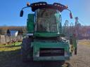 For sale John Deere W540 combine with corn adapter