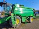 For sale John Deere W540 combine with corn adapter