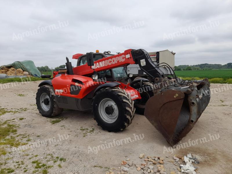 Manitou 735, 2013 vintage z łyżką pelikana na sprzedaż