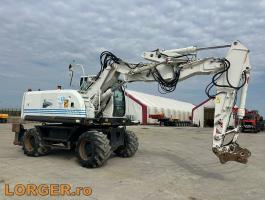 Hitachi ZX 140W-3 gumikerekes kotró