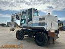 Hitachi ZX 140W-3 bager z gumijastimi kolesi