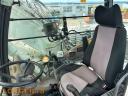 Hitachi ZX 140W-3 bager z gumijastimi kolesi
