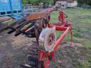 Head slotted, alternately rotating plough