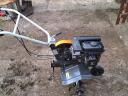 For sale an Oleo-Mac hoe
