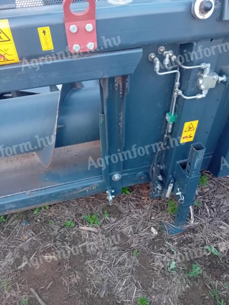 Adaptér na zber slnečnice NAS pre kombajn John Deere