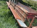 Service bed spreader, ball separator
