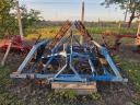 Folding hanging rack with ratchet