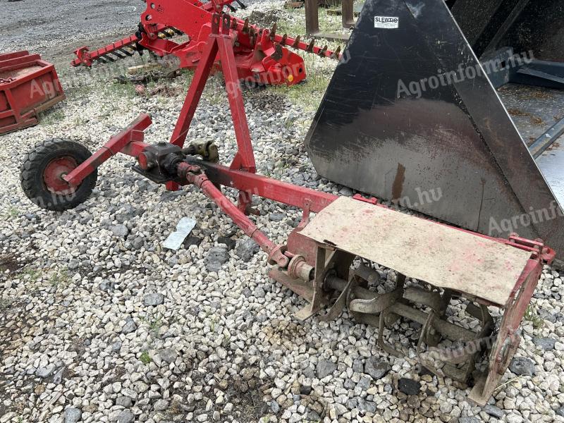 Side-mounted tiller