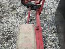 Side-mounted tiller