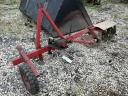 Side-mounted tiller