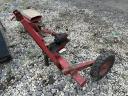 Side-mounted tiller