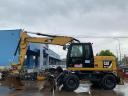 Caterpillar M313D rubber wheel excavator