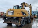 Caterpillar M313D rubber wheel excavator