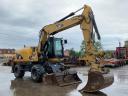 Caterpillar M313D rubber wheel excavator