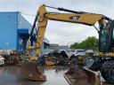Caterpillar M313D rubber wheel excavator