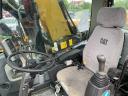 Caterpillar M313D rubber wheel excavator