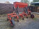 Row cultivator, 6-row, with folding fertiliser spreader