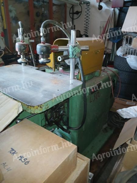 Oscillating longitudinal drilling machine