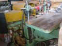 Oscillating longitudinal drilling machine
