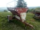 Trailed swing-tube fertiliser spreader STS