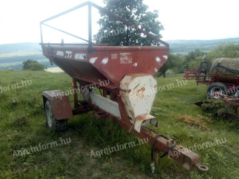 Trailed swing-tube fertiliser spreader STS