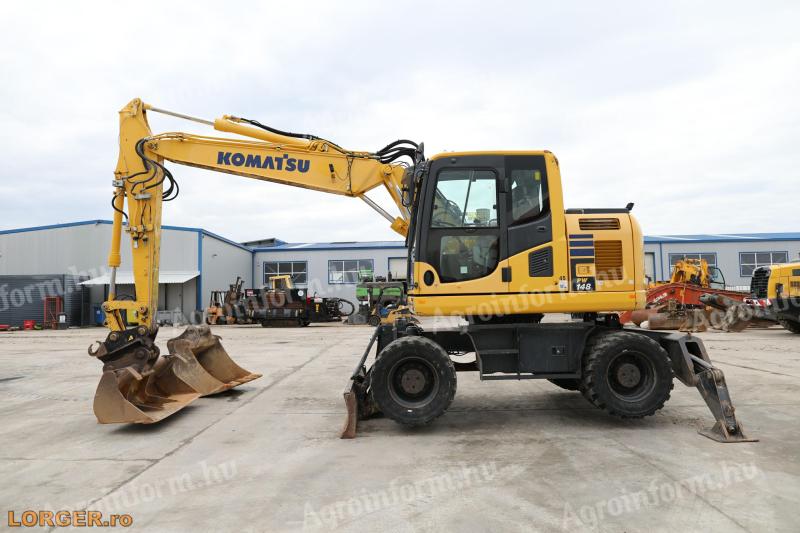 Rypadlo Komatsu PW148-10 s gumovými koly