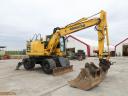 Rypadlo Komatsu PW148-10 s gumovými koly