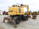 Rypadlo Komatsu PW148-10 s gumovými koly