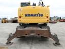 Rypadlo Komatsu PW148-10 s gumovými koly