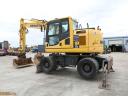 Rypadlo Komatsu PW148-10 s gumovými koly