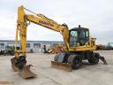 Rypadlo Komatsu PW148-10 s gumovými koly