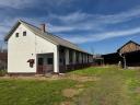 1884 m² utilised building plot with farm buildings