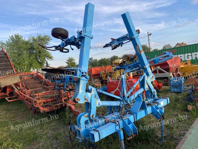 Cultivator MONOSEM cu 6 rânduri cu arc de vânzare în stare bună cu sistem hidraulic