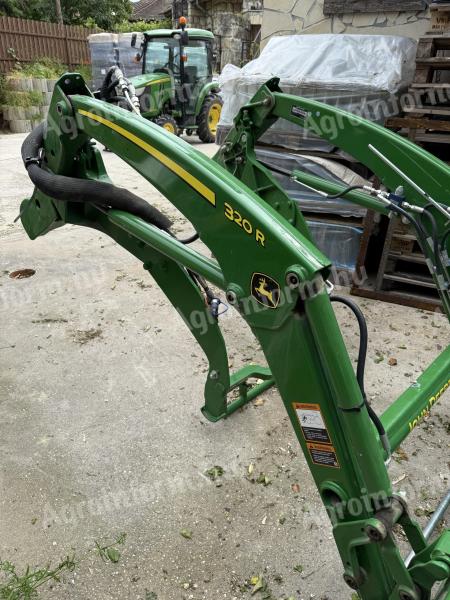 John Deere 320R front loader