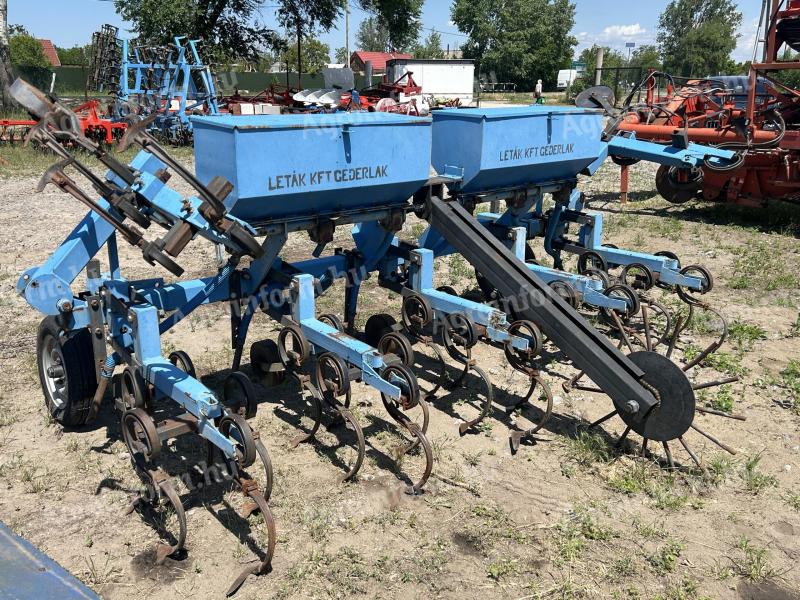 Hoses 6 row spring-loaded row cultivator with fertilizer spreader