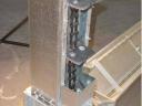 Grain handling with serrated and chain hoist