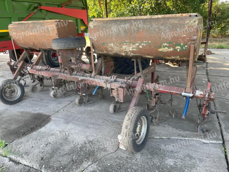 Row cultivator, fertiliser spreader