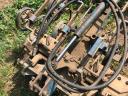 Hydraulically adjustable width spring-loaded cultivator, gruber