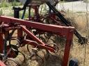 Cultivator with fertiliser spreader