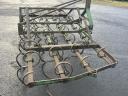 Cultivator with spring tine