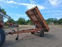 Single-axle tipper trailer with iron sides and platform