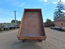 Single-axle tipper trailer with iron sides and platform